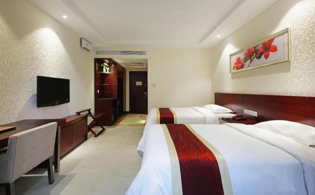 Bed in Nanfang Dasha Hotel