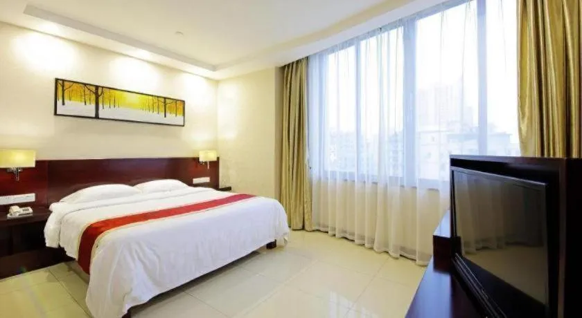 Bed in Nanfang Dasha Hotel