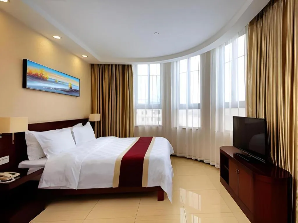 Bed in Nanfang Dasha Hotel