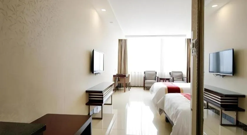 Bed in Nanfang Dasha Hotel