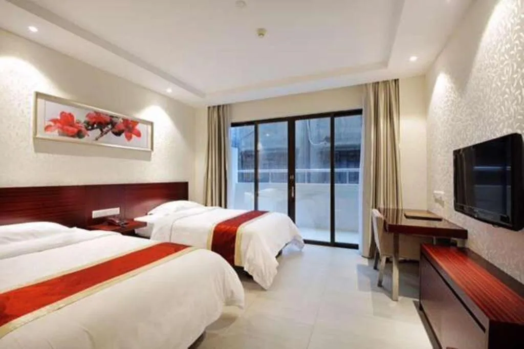 Bed in Nanfang Dasha Hotel