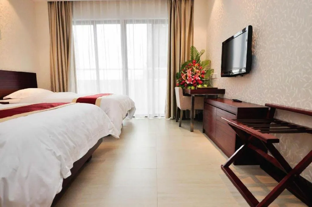 Bed in Nanfang Dasha Hotel