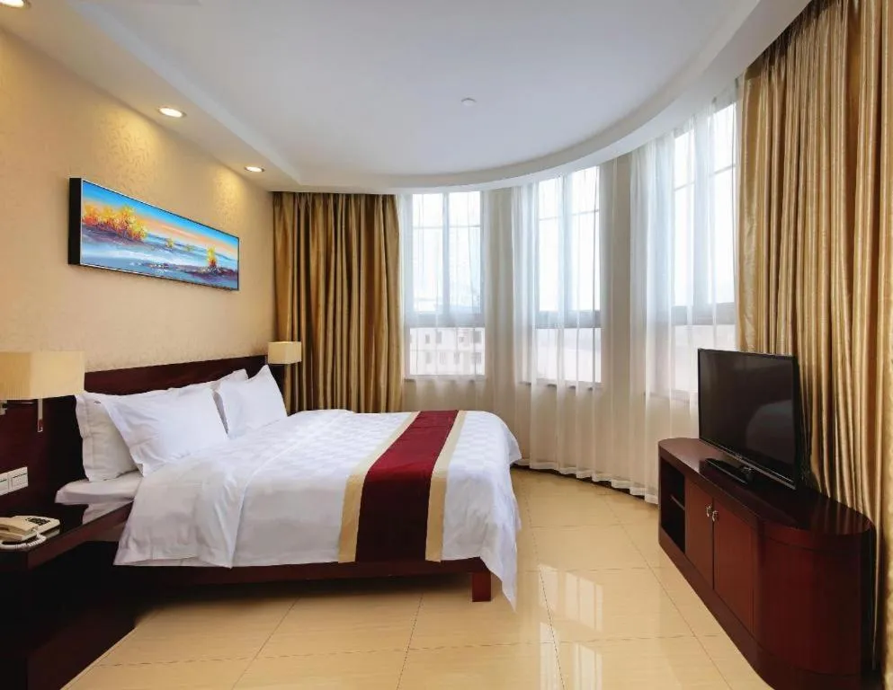 Bed in Nanfang Dasha Hotel