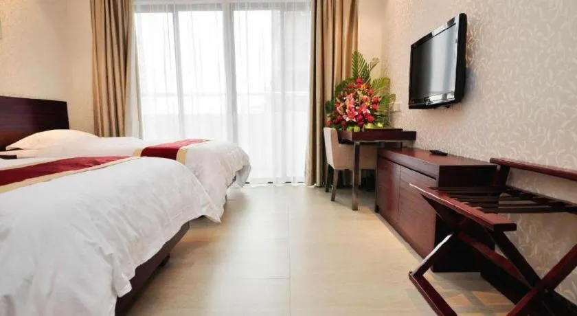 Bed in Nanfang Dasha Hotel