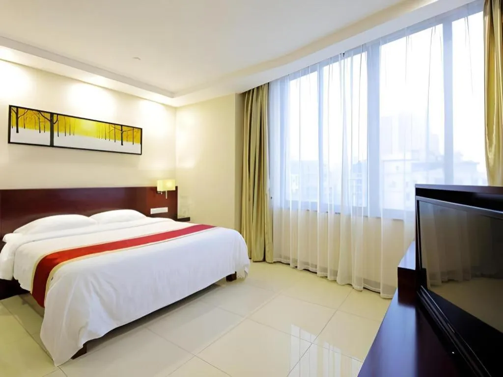 Bed in Nanfang Dasha Hotel