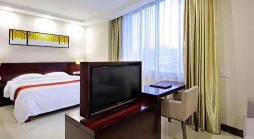 Bed in Nanfang Dasha Hotel