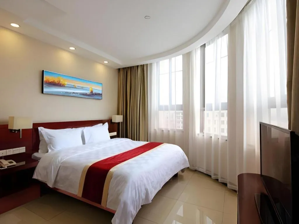 Bed in Nanfang Dasha Hotel