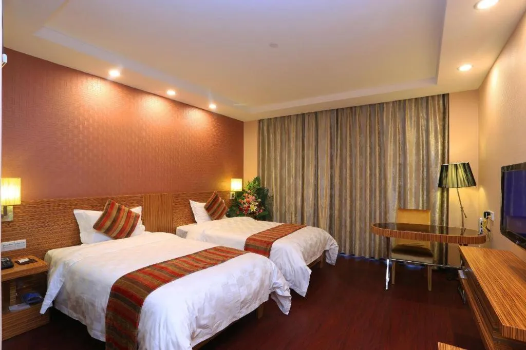 Bed in Nanfang Dasha Hotel
