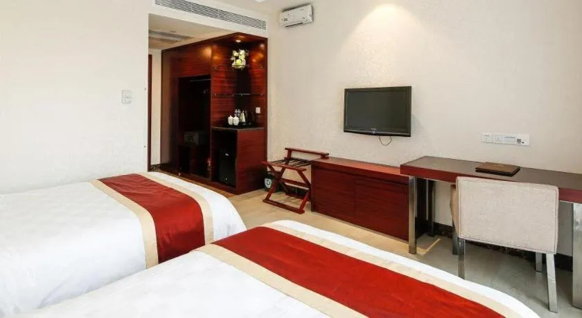 Bed in Nanfang Dasha Hotel