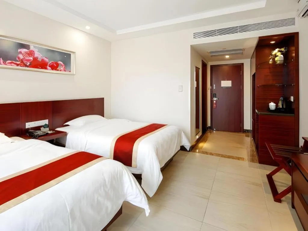 Bed in Nanfang Dasha Hotel