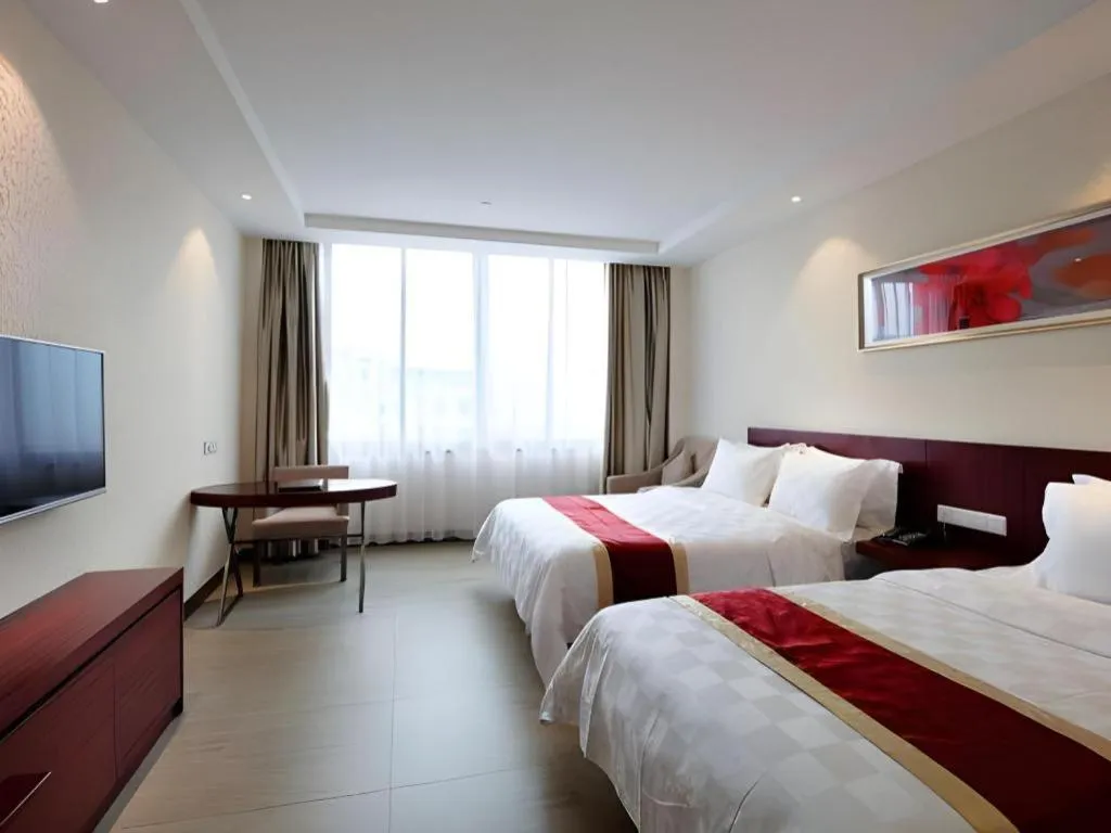 Bed in Nanfang Dasha Hotel