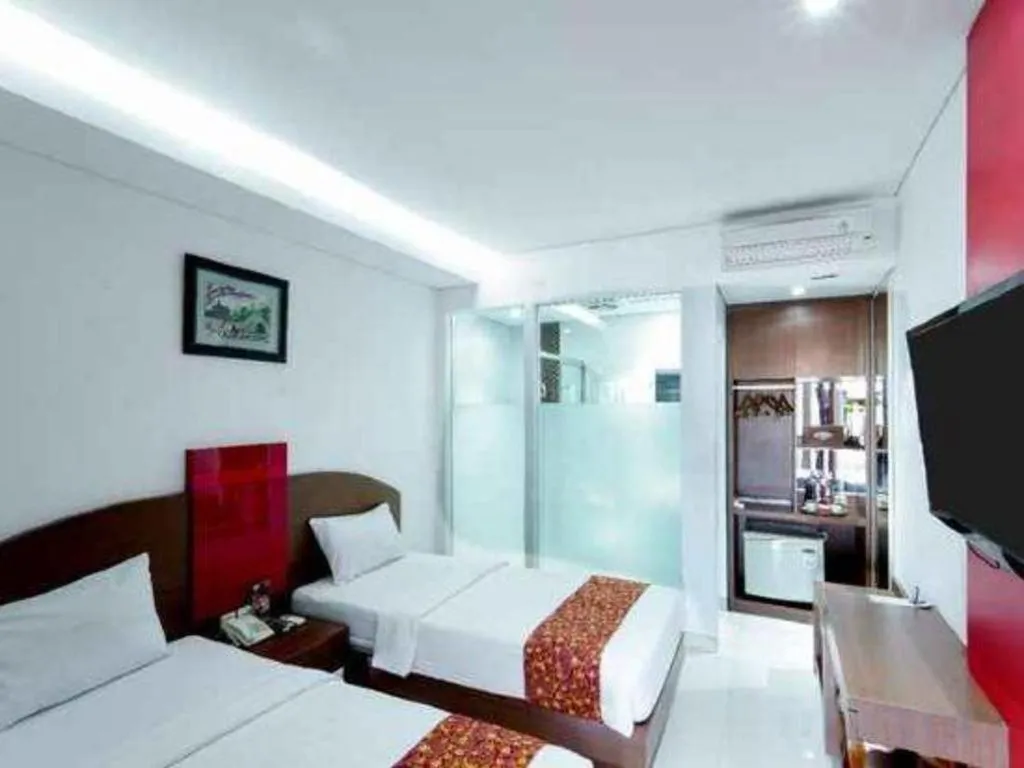 Bed in Kenari Asri Hotel