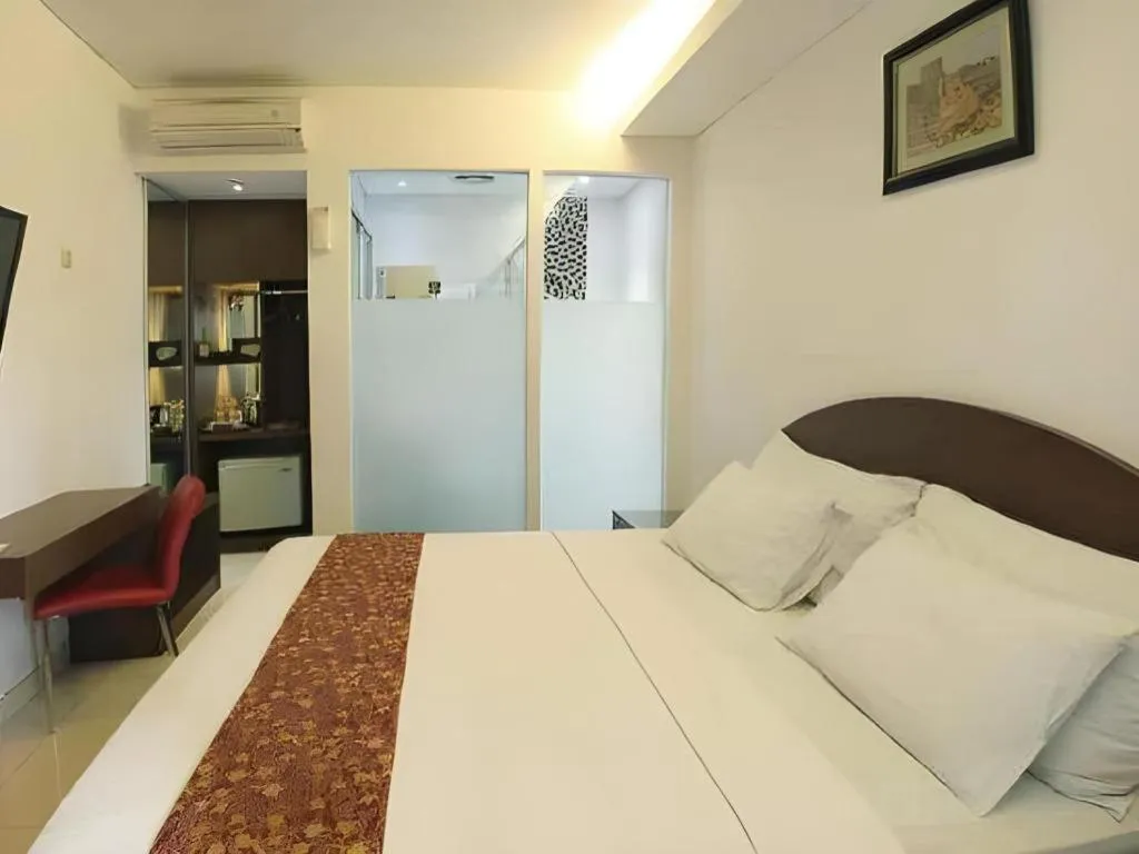 Bed in Kenari Asri Hotel