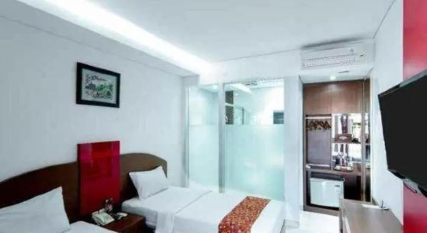 Bed in Kenari Asri Hotel