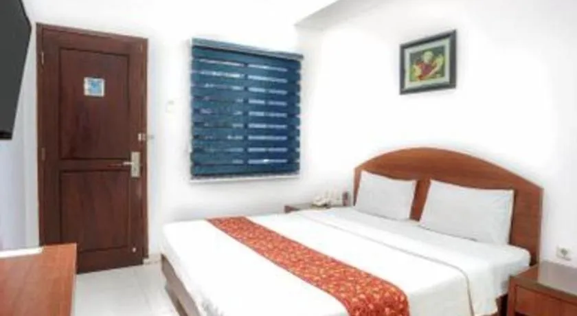 Bed in Kenari Asri Hotel