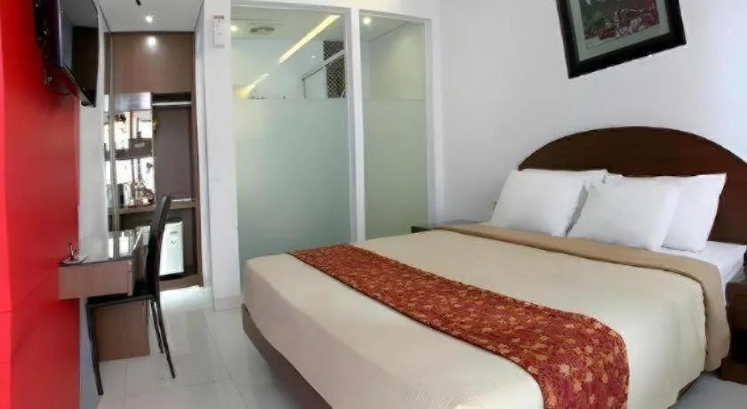 Bed in Kenari Asri Hotel