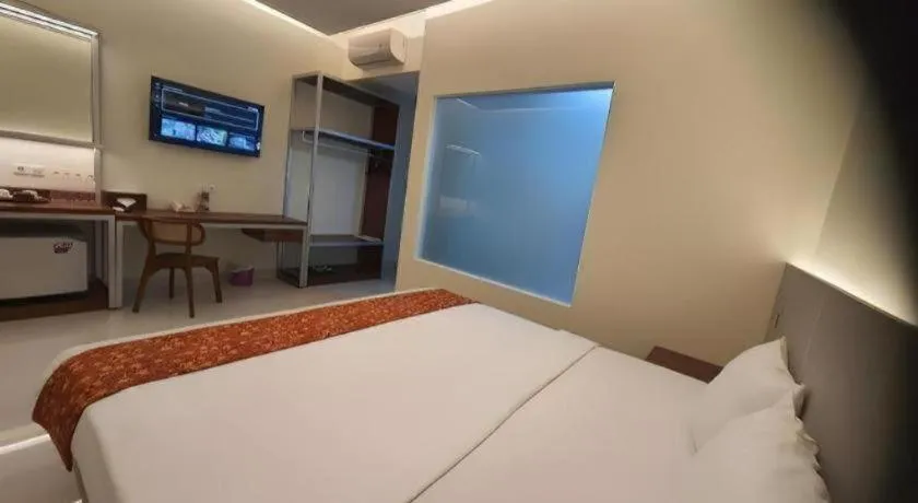 Bed in Kenari Asri Hotel