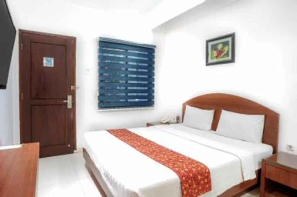 Bed in Kenari Asri Hotel