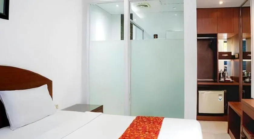 Bed in Kenari Asri Hotel