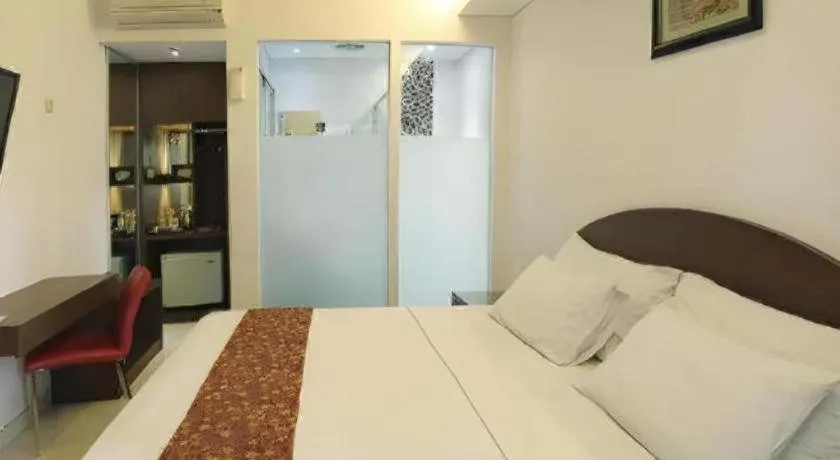 Bed in Kenari Asri Hotel