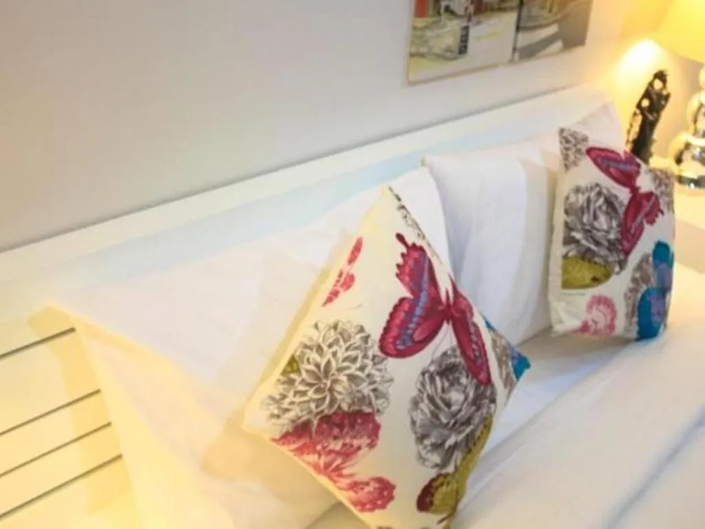 Bed in Chic Hotel Suratthani