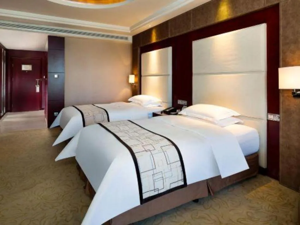 Bed in Northwest Petroleum Hotel