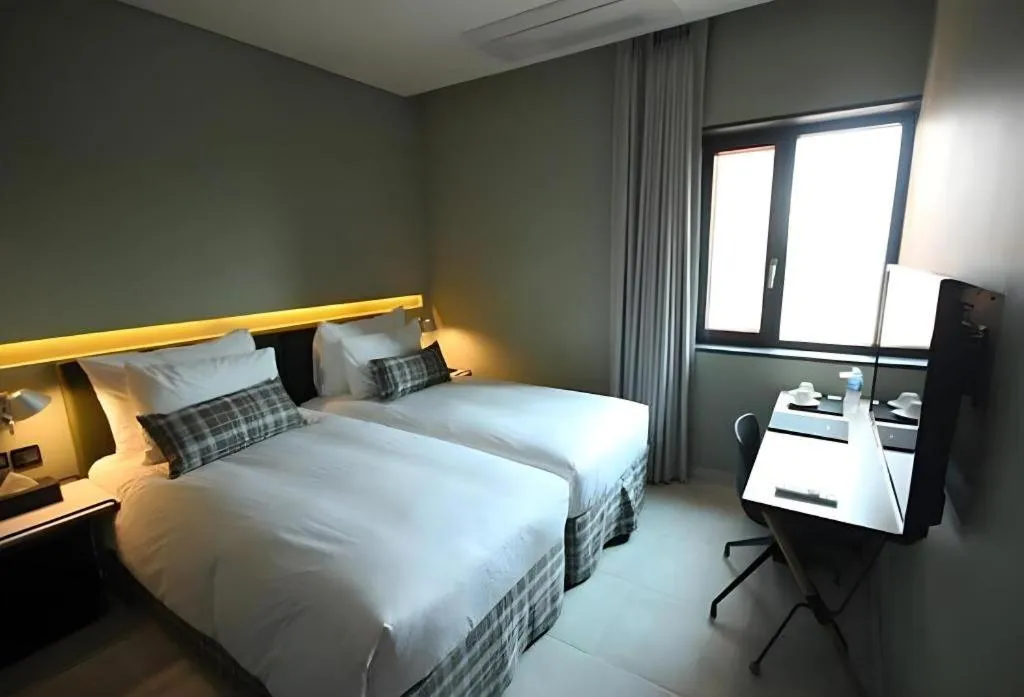 Bed in Everrich Hotel