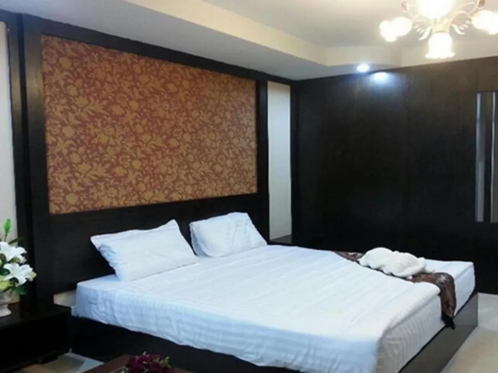 Bed in Le Parc Wangnang Hotel