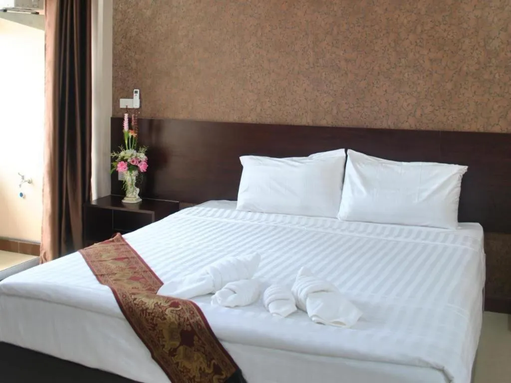 Bed in Le Parc Wangnang Hotel