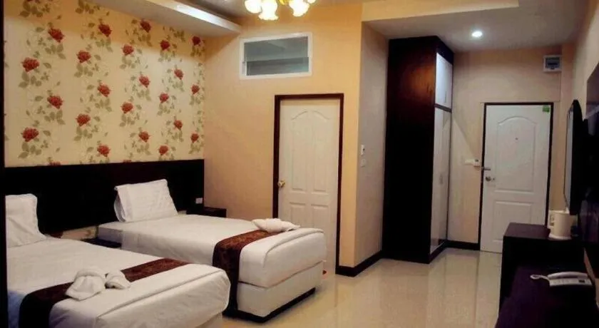 Bed in Le Parc Wangnang Hotel