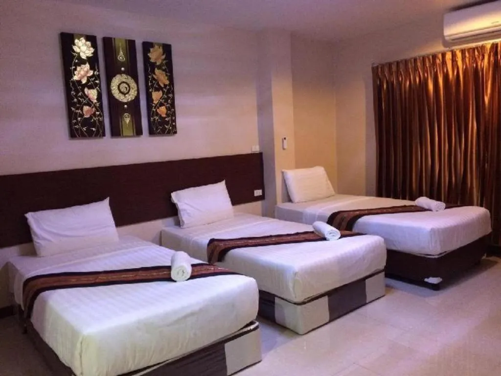 Bed in Le Parc Wangnang Hotel