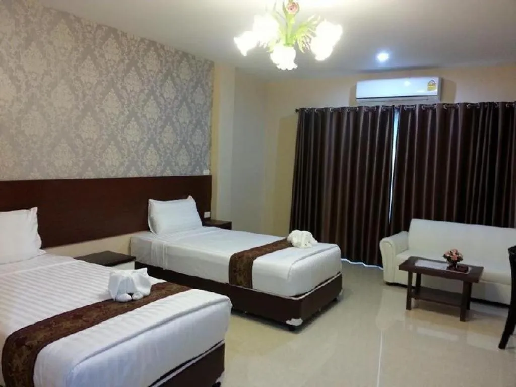 Bed in Le Parc Wangnang Hotel