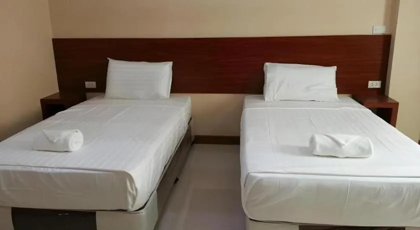 Bed in Le Parc Wangnang Hotel