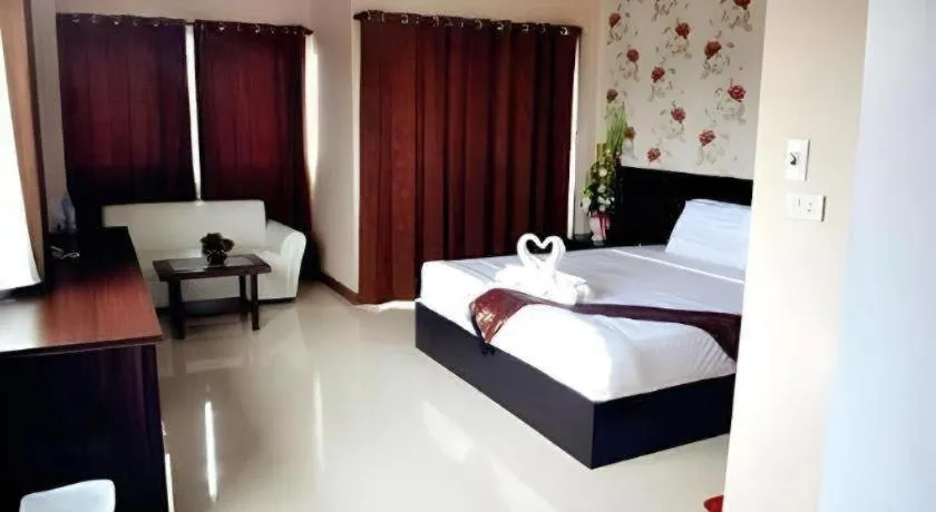 Bed in Le Parc Wangnang Hotel