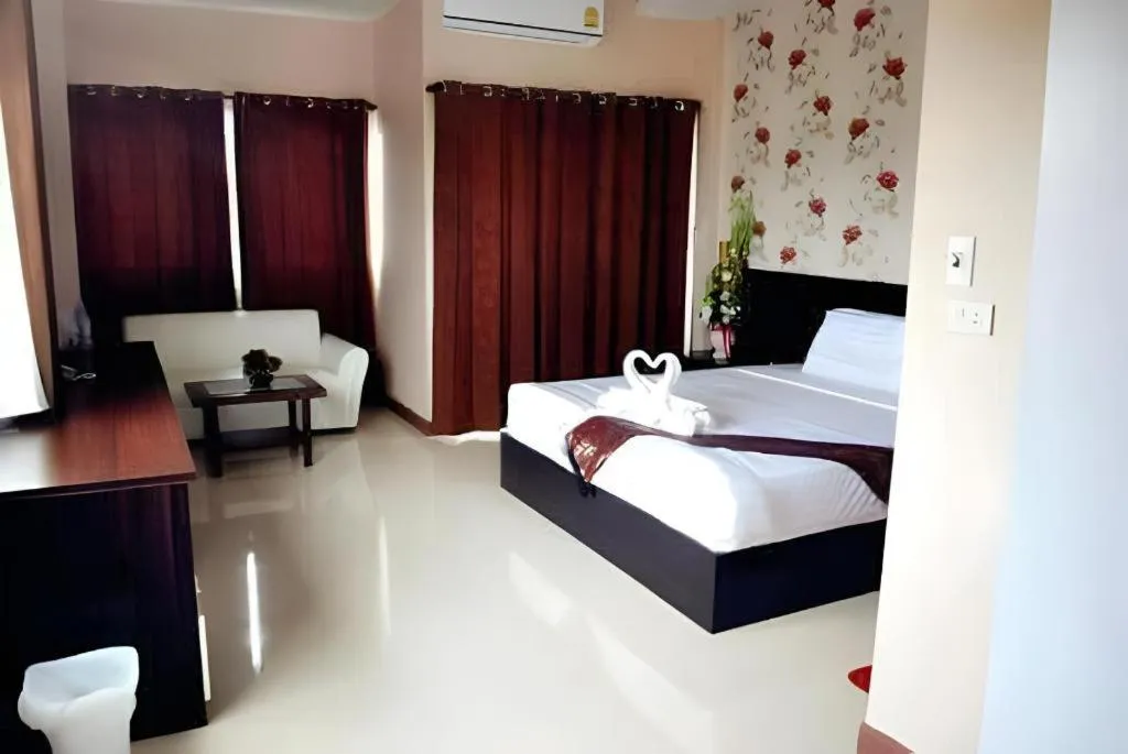 Bed in Le Parc Wangnang Hotel