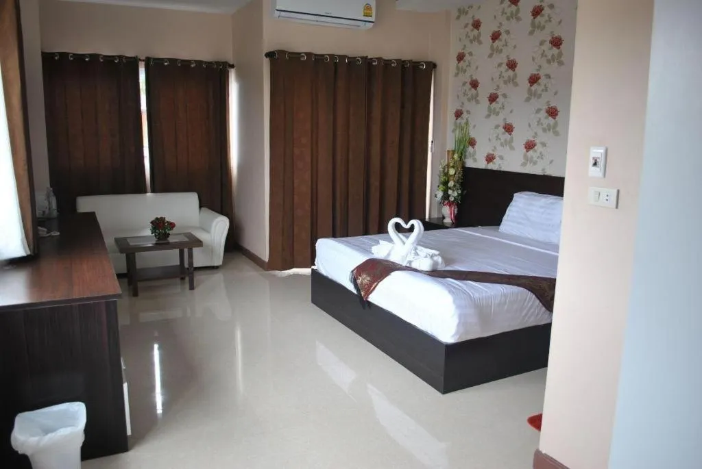 Bed in Le Parc Wangnang Hotel