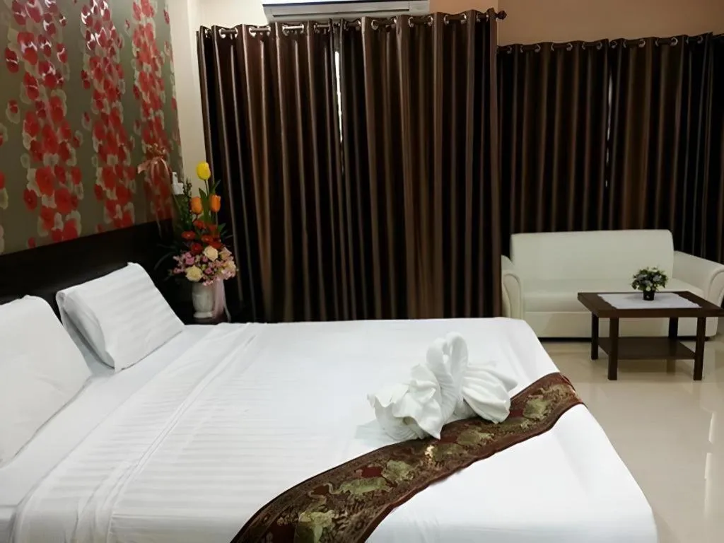 Bed in Le Parc Wangnang Hotel