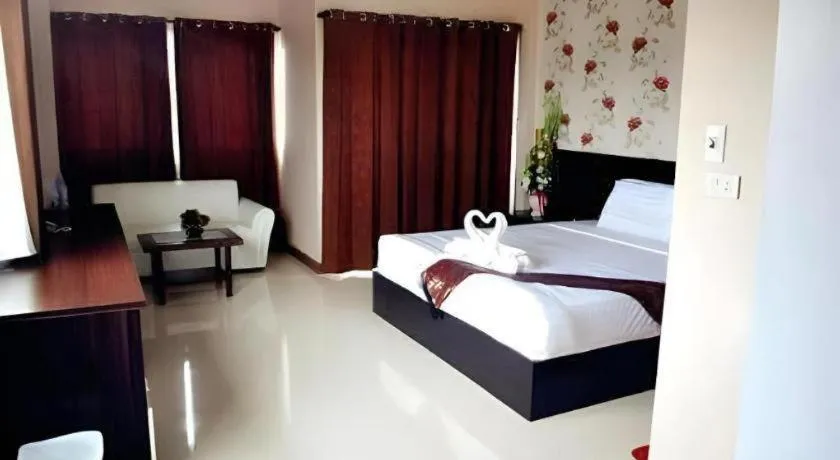 Bed in Le Parc Wangnang Hotel