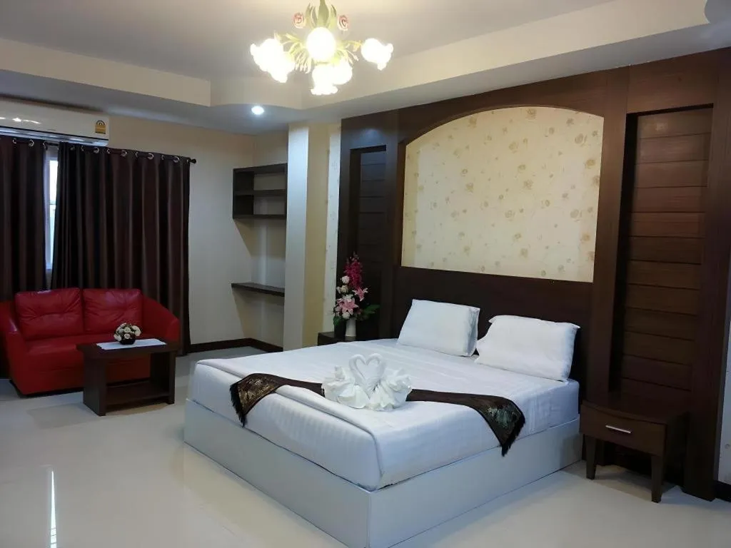 Bed in Le Parc Wangnang Hotel