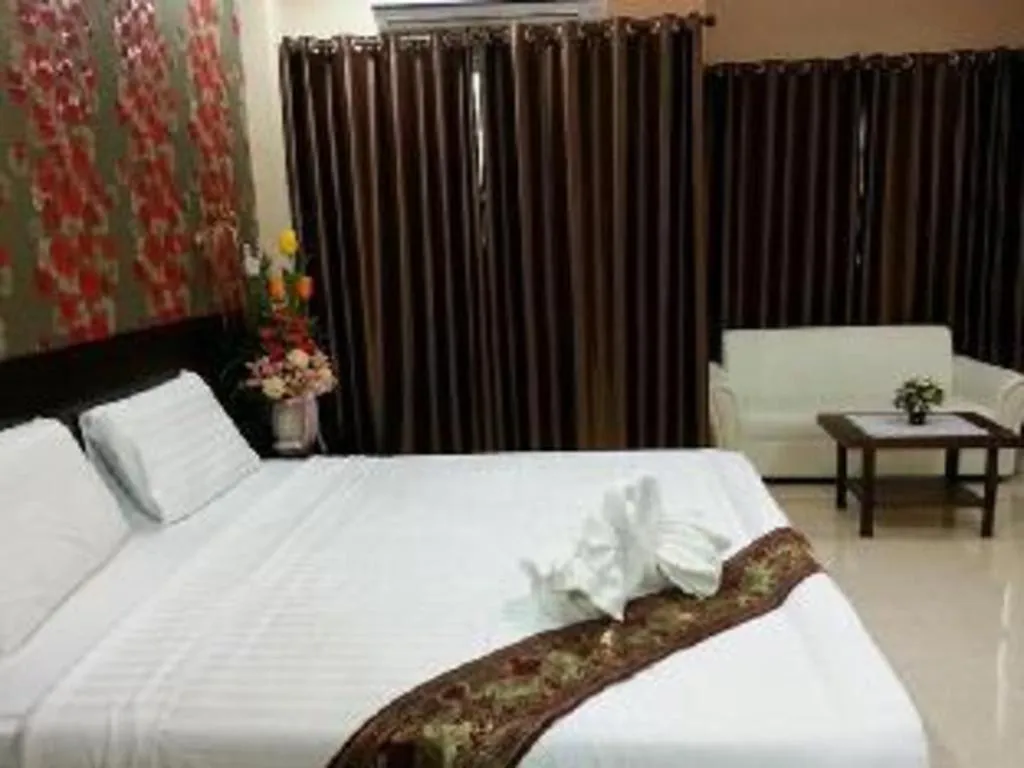 Bed in Le Parc Wangnang Hotel