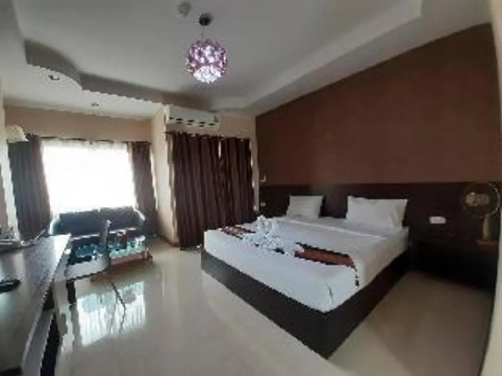 Bed in Le Parc Wangnang Hotel