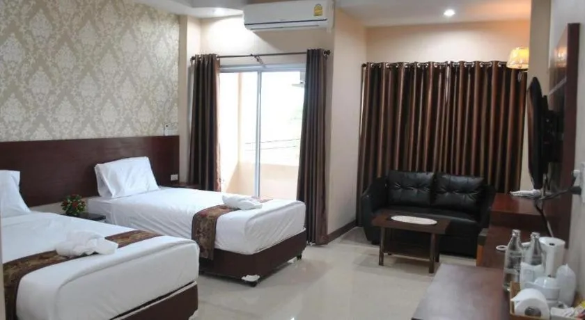 Bed in Le Parc Wangnang Hotel