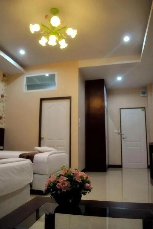 Bed in Le Parc Wangnang Hotel