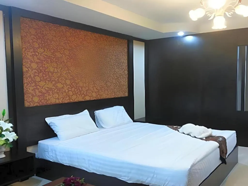 Bed in Le Parc Wangnang Hotel