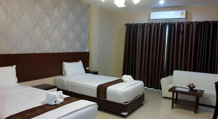 Bed in Le Parc Wangnang Hotel