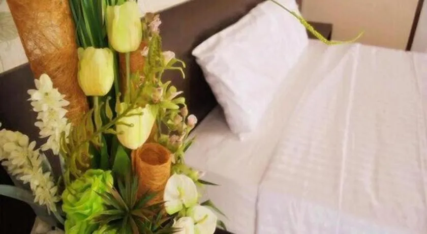 Bed in Le Parc Wangnang Hotel