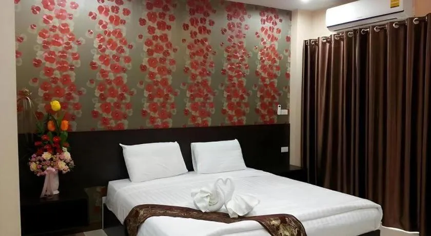 Bed in Le Parc Wangnang Hotel