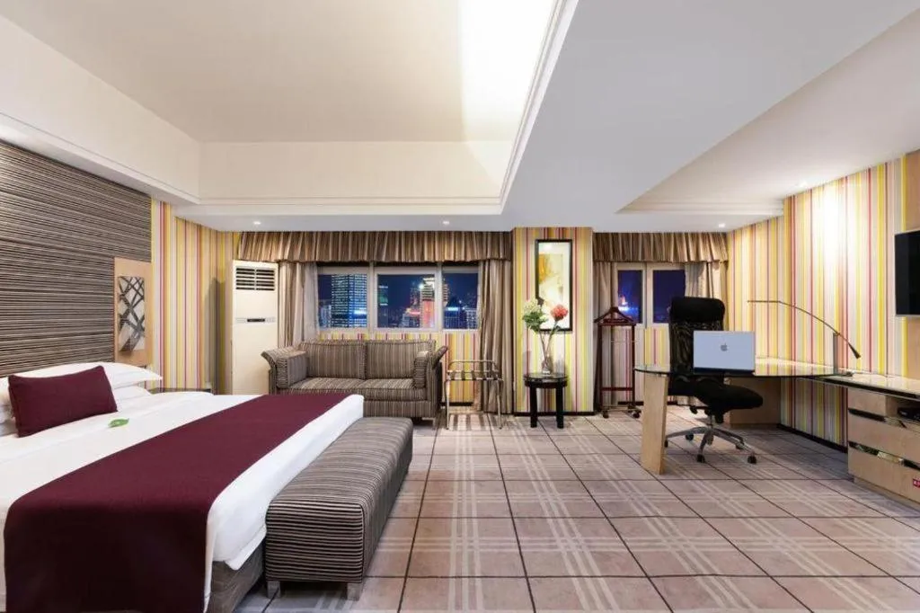 Bed in Nanning Sanzan Hotel