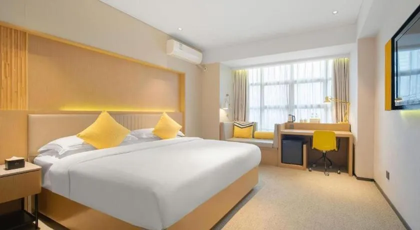 Bed in Nanning Sanzan Hotel