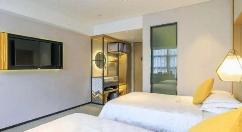 Bed in Nanning Sanzan Hotel